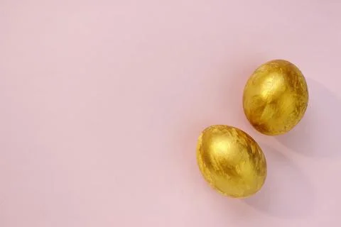 Stylish golden eggs easter concept. Flat lay trendy easter. Happy easter. Cop Stock Photos