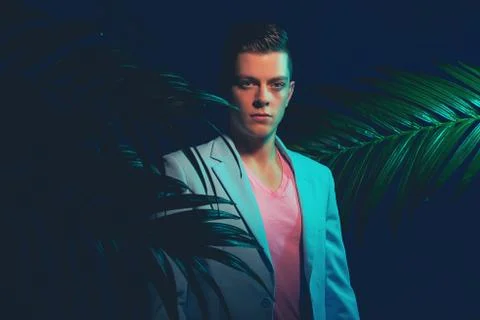 Stylish Gorgeous Young Man Between Palm Plants Stock Photos