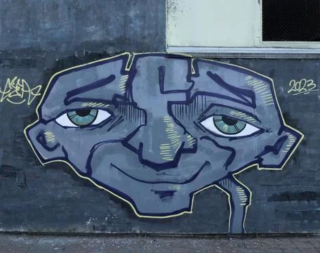 Stylish Graffiti on the wall Stock Photos