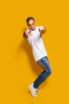 Stylish guy pointing at camera Fotos de archivo