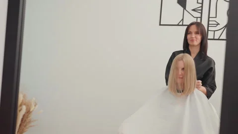 Stylish Hair Makeover Experience, Relaxed Atmosphere Enhances Hair Styling Stock Footage 331066787