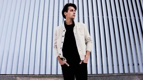 Stylish, handsome guy in the hat, waiting for her. Hipster model appearance. Stock-Footage 54684587