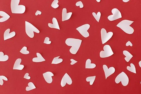 Stylish hearts composition on red background flat lay. Valentines day card... Stock Photos