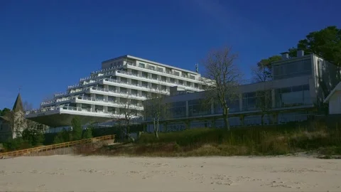 Stylish hotel in early spring on the beach Video stock 247900671