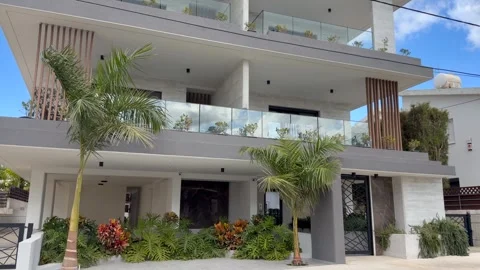 Stylish house with modern facade palm trees and spacious balconies. House Stock Footage 328352007