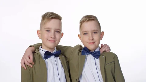 Stylish Identical Twins Posing on White Background Stock Footage 109272092