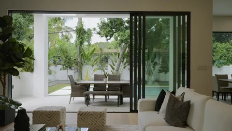 Stylish interior design of spacious apartment with private garden surrounded by Stock Footage 258403164