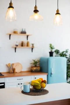 Stylish kitchen interior with dining table and chairs Stock Photos