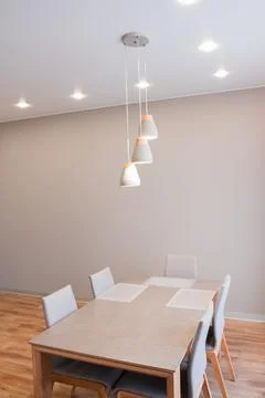 Stylish kitchen interior with dining table and chairs Fotos Stock