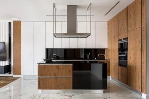 Stylish kitchen with wooden elements Stock Photos