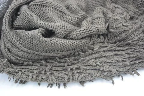 Stylish knitted from brown, woolen thread with an interesting pattern. 스톡 사진
