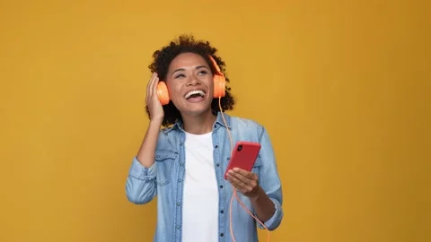 Stylish lady listen device headset dance isolated bright color background Video stock 167553879