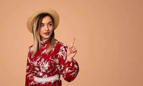 Stylish lady pointing at empty space Stock Photos