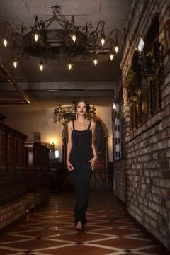 Stylish lady posing like a model in luxurious hall Stock Photos