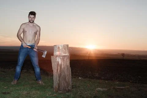 The stylish lumberjack at work. Stock Photos