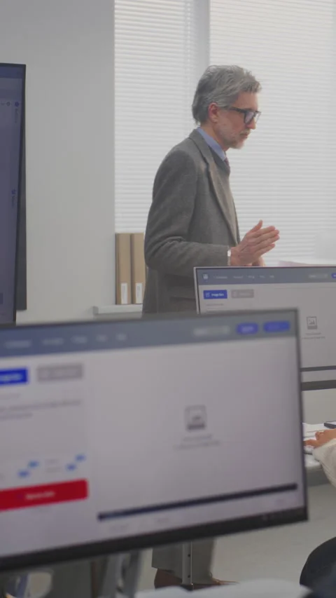 Stylish Male Instructor Explaining AI Generation Principles to Adult Students Stock Footage 321254608