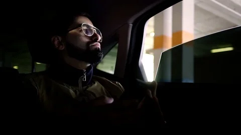 Stylish man on a backseat of a car Stockbeeldmateriaal 88058388