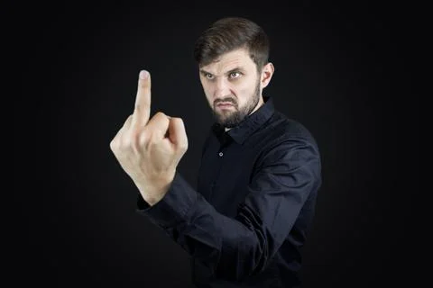Stylish man with beard on black background Stock Photos