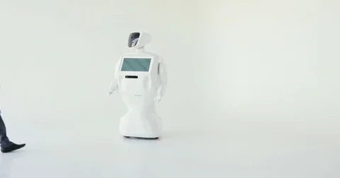 A stylish man communicates with a robot, presses a plastic mechanical arm to the Stock Footage 80425013