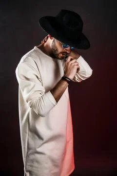 Stylish man in hat vaping Stock Photos