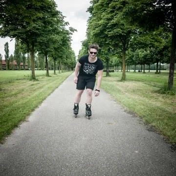 Stylish man in the park Stock Photos