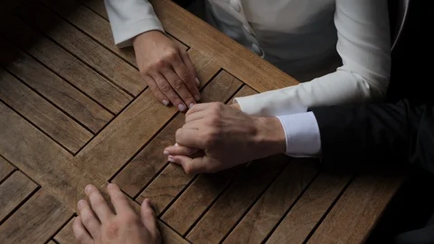 Stylish man takes the hand of a young girl. Stock Footage 121925105
