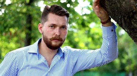 Stylish men, bearded face in the Park Stock Footage 66064406