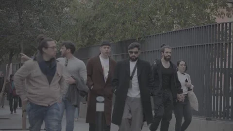 Stylish men walking down the street in Madrid, Spain Stock Footage 345031091