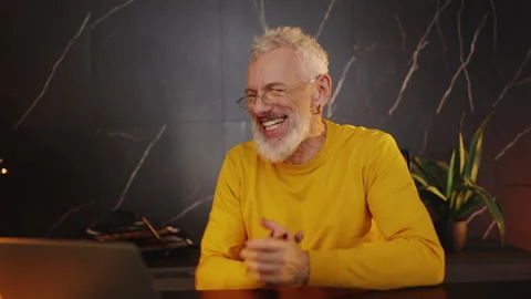 Stylish middle-aged CEO celebrating a successful product launch and breakthrough Stock Footage 340902480