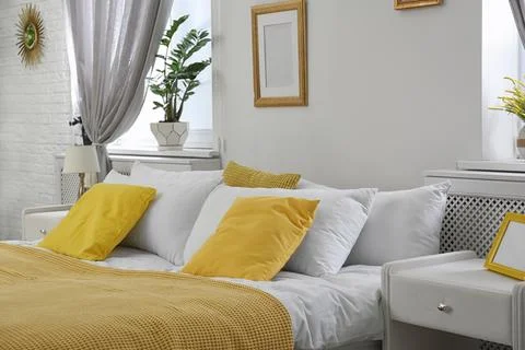 Stylish modern bedroom with decorative elements. Idea for interior design Stock Photos
