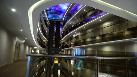 Stylish modern dark hotel hallway. Glass board metal handrails. Space ceiling Stock Footage
