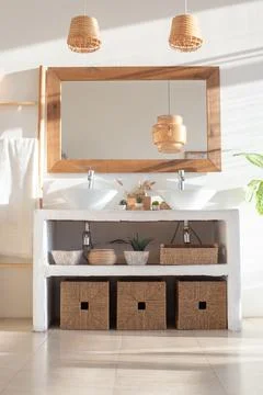 Stylish modern interior of a bright, white bathroom with two sinks Stock Photos