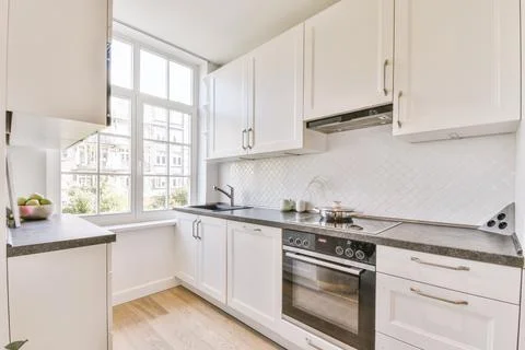 Stylish modern oblong kitchen Fotos de archivo