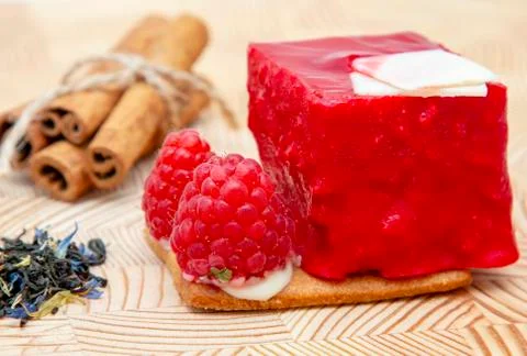 Stylish new creative raspberry cake on a wooden background Stock Photos