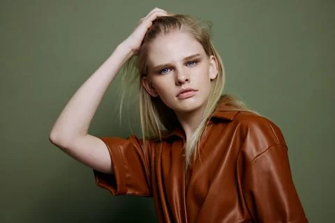 Stylish offer. Headshot portrait of beautiful blonde female model looks at Stock Photos