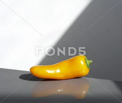 Stylish orange paprika pepper Stock Photos