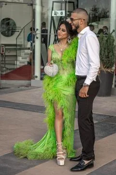 A stylish pair of the students are posing at the Graduate prom Stock Photos