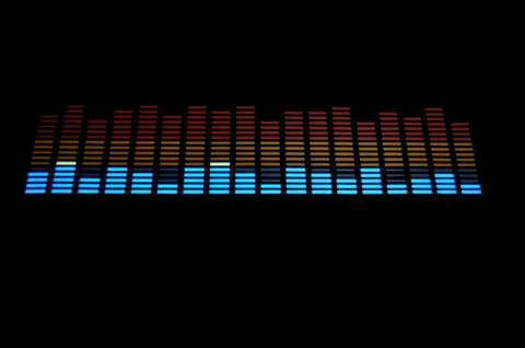 Stylish panel of pixels, neon with blue or green, yellow, red, equalizer in dark Stock Photos