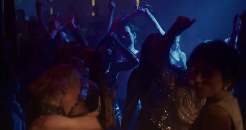 Stylish Party People Dancing at a Rave Stock Footage 320700285
