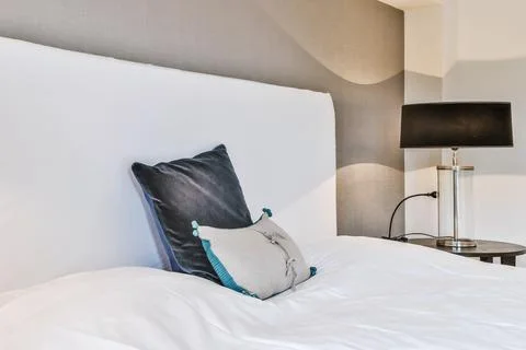 Stylish patterns on bed Stock Photos