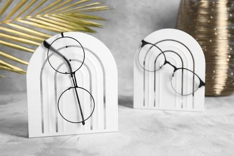 Stylish presentation of glasses on light grey background Stock Photos