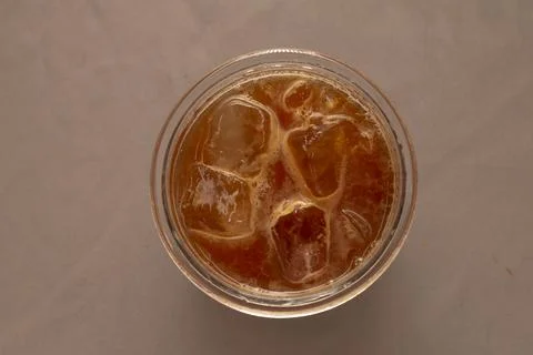 Stylish presentation highlighting rich coffee and sculpted ice blocks Stock Photos