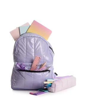 Stylish purple school backpack with different stationery supplies on white ba Stock Photos