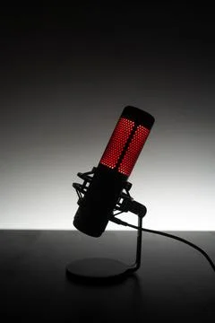 Stylish Red LED Microphone Presented in Attractive Silhouette and Elegant Design Stock Photos