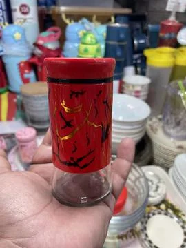 A stylish red teapot, elegantly designed for brewing and serving your favor.. Stock Photos