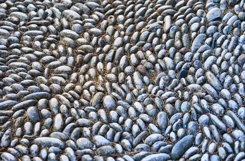 Stylish road pattern made with pebbles for design 写真素材