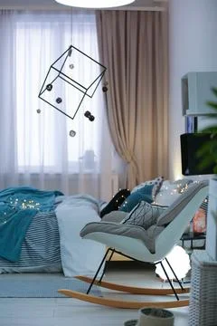 Stylish room interior with comfortable bed and decor 스톡 사진