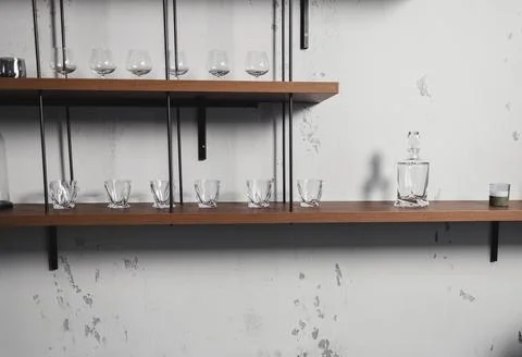 Stylish shelf with various dishware Stock Photos