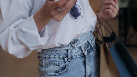 Stylish Shopper Using Phone After Shopping Stockbeeldmateriaal 311886432