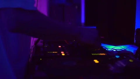 Stylish Slavic guy wearing white T-shirt playing on DJ booth. Young Caucasian Stock Footage 95928191